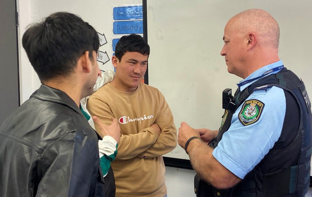 Abdul Fatah Rizai talking with police at NSF Fairfield campus