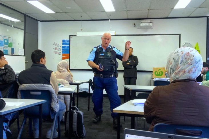 A policeman giving a presentation in a classroom at NSF Fairfield college tile thumbnail