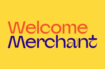 Welcome Merchant logo with yellow background and orange/purple text